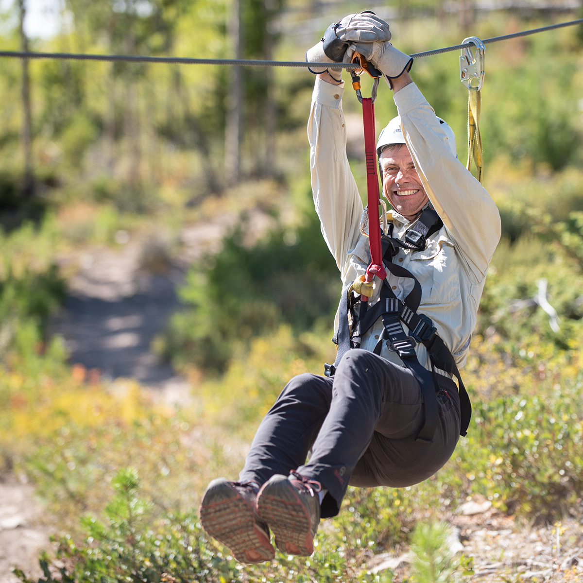 Guest enjoying zipline thrill