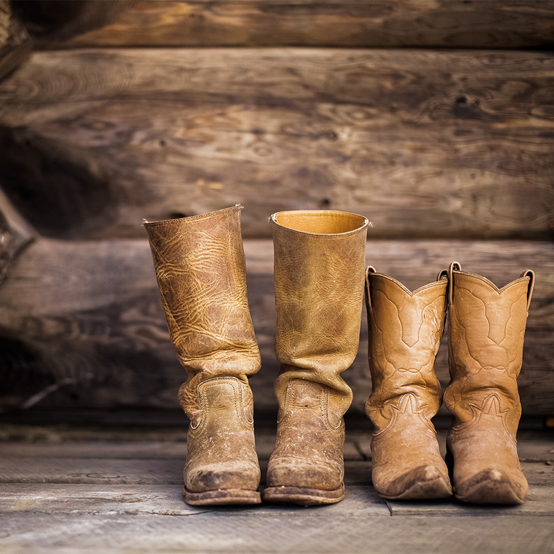 boots Adult and child cowboy boots on front porch