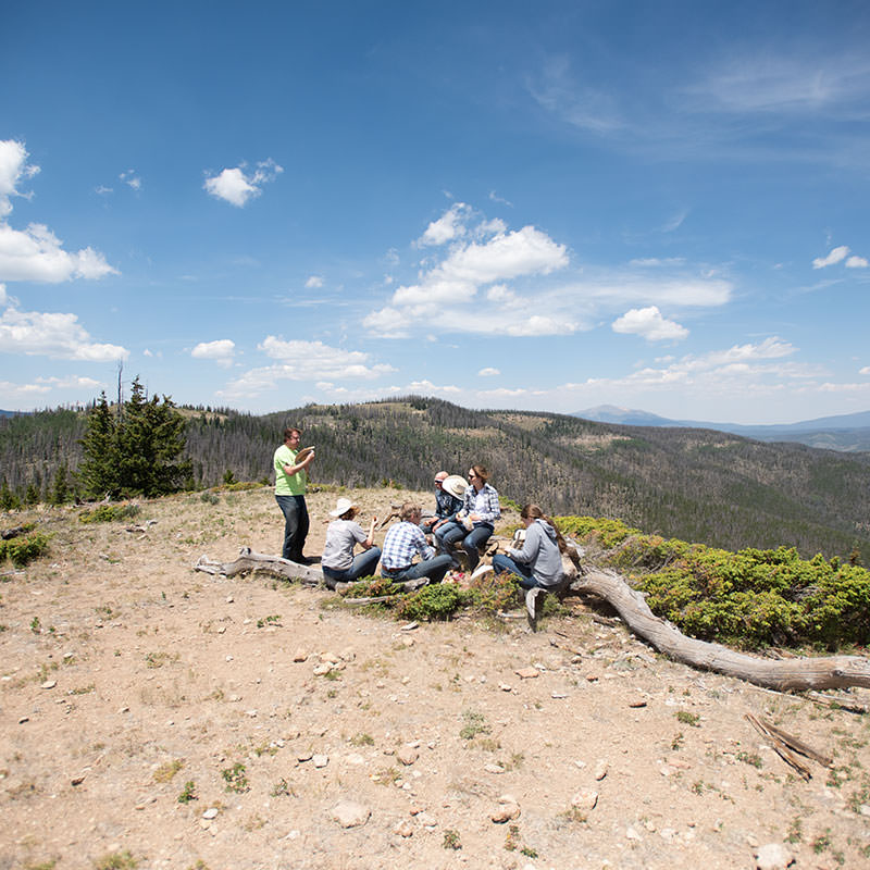People enjoying a relaxing afternoon on the mountainside