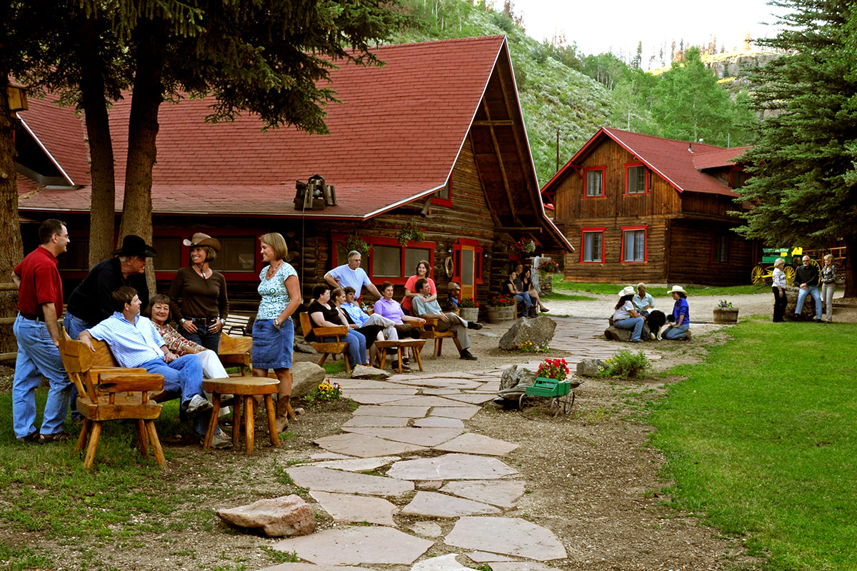 lodge-1200px folks outside the lodge at Drowsy Water Ranch